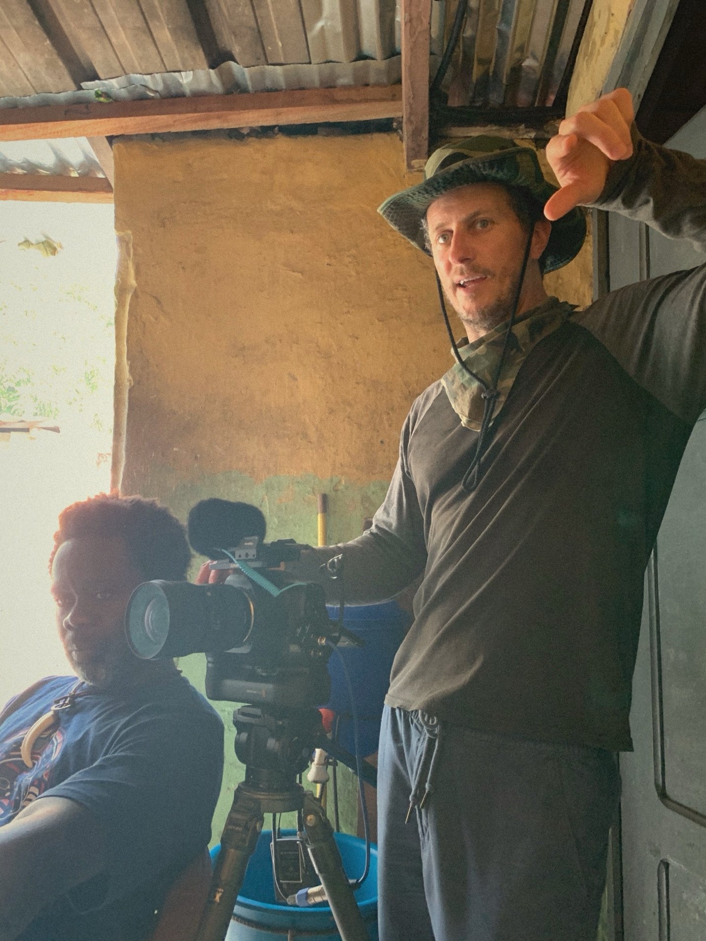 Director Jesse Bernstein on set with camera